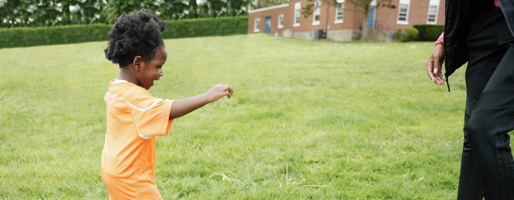 a child playing with a ball