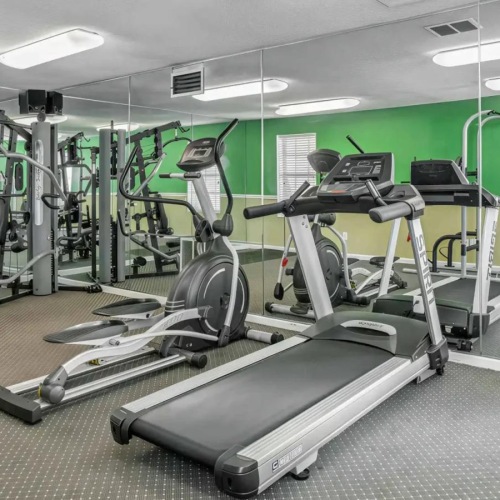 a gym with treadmills