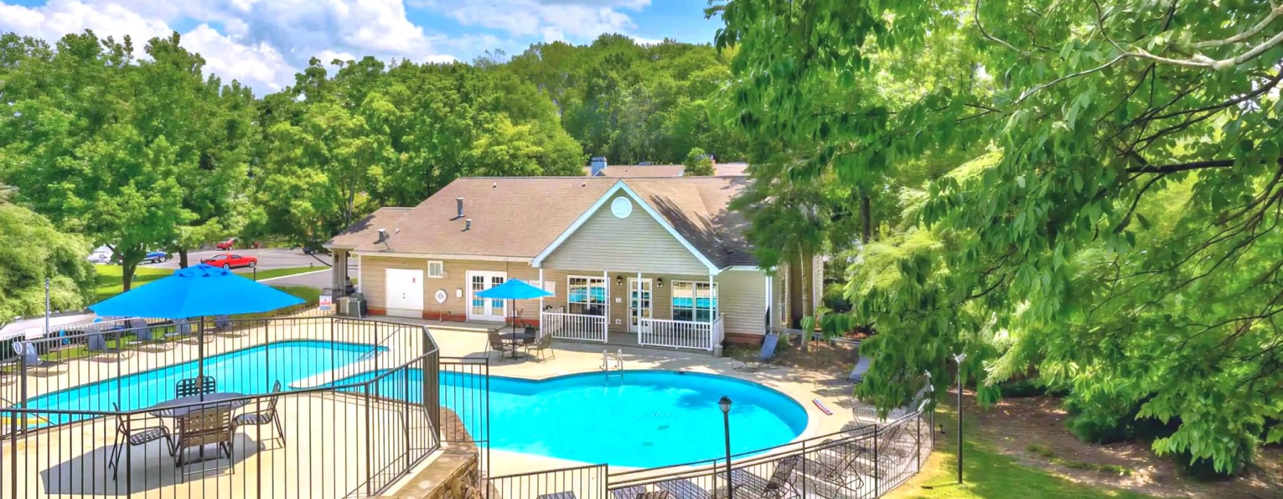 an apartment with a swimming pool